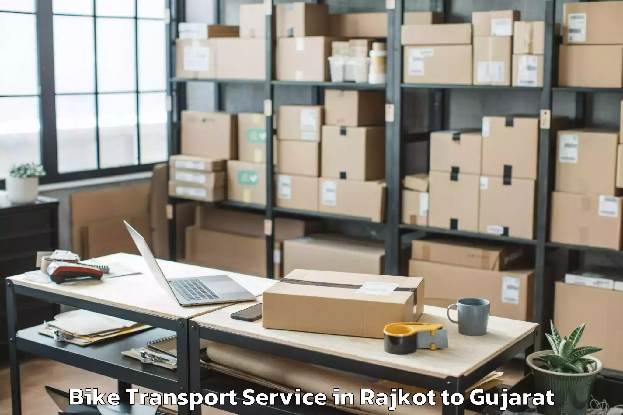 Hassle-Free Rajkot to Shri Govind Guru University Go Bike Transport